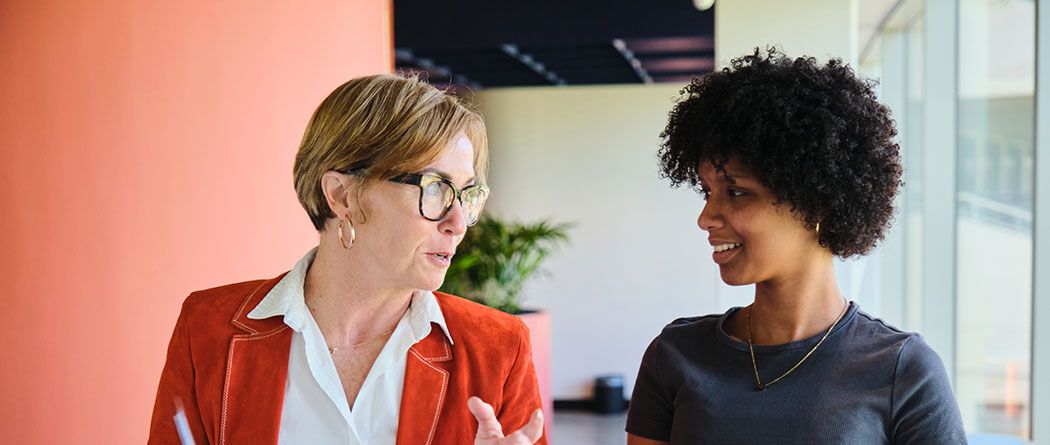 Executive leadership team meeting in conference room